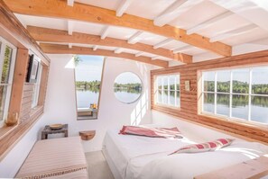 Interior space - double bed with seating (2)