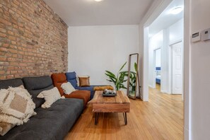 Living Room: Open and airy with stylish touches and room for the whole group to relax