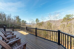 Relax on the open-air deck to take in the stunning mountain views.