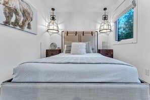 Bedroom 1: Queen bed, main floor