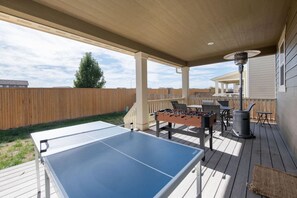 Foosball, Ping pong and Space Heaters Under the Covered Patio