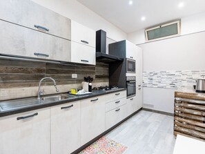 Furniture, Interior Design, Chair, Table, Dining Room, Kitchen & Dining Room Table, Flooring, Floor, Lighting, Room