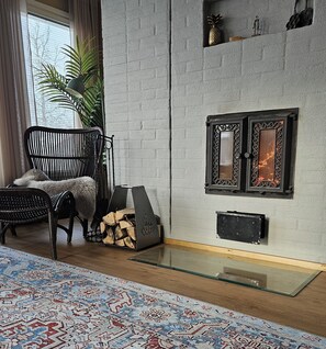 Living room and cozy fireplace.