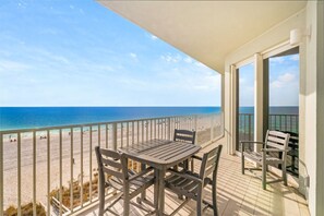 Relax on your private beachfront balcony with breathtaking ocean views, perfect for soaking up the sun and sea breeze
