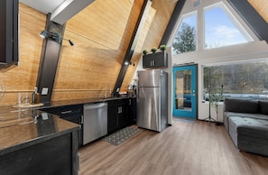 Nature isn’t just outside, it’s part of the experience. We literally turned the house around to create a design where floor to ceiling window, showcase, breathtaking beauty of the creek and the surrounding outdoors.