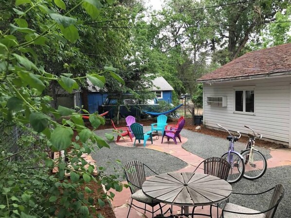 Spacious Backyard | Adirondack Chairs, Fire Pit, Bicycles