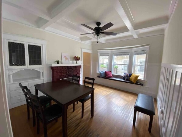 Spacious dining room, great for working or enjoying a meal.