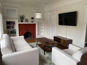 Living room cable TV and apps for Netflix, etc.