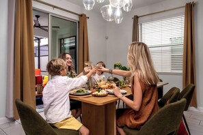 Family dinner moments! Cozy dining space, delicious food & joyful toasts!