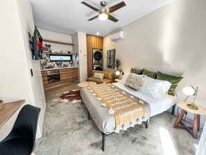 Convenient and Stylish Laundry Space with Full Kitchen