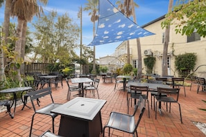 Just off the seating area is a large open air patio for relaxing, dining and having a cocktail