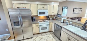Amazing kitchen, full-sized appliances, fully stocked and renovated!