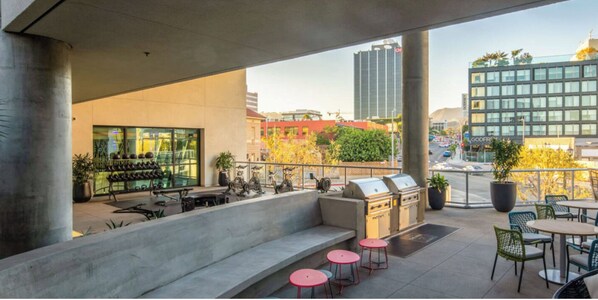 Indoor/ outdoor gym + bbq's, outdoor lounge area with fire pits