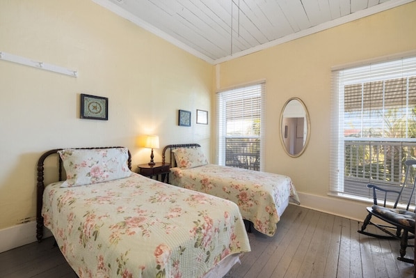 Room 28 has 2 twin beds and a private bath across the hall
