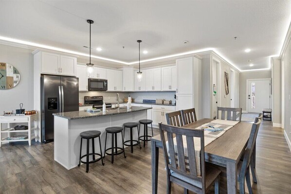 Lake Loft's fully equipped kitchen lets you cook and dine with a view!