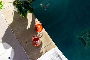 Relax in this cabin's private pool, where the peaceful atmosphere of the Smoky Mountains enhances your perfect retreat.