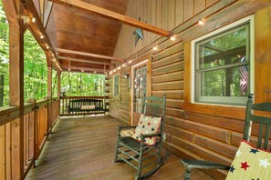 Rock or swing on the outside porch while listening to the wilderness