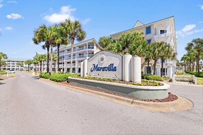 Gated entrance with entrance in front (Scenic Gulf Dr.) and back (Hwy. 98).