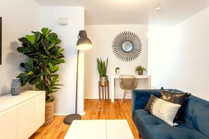 Living Room: Sun-drenched comfort with rich textures and soft, ambient lighting throughout