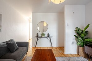 Living room with cozy seating and minimalist decor