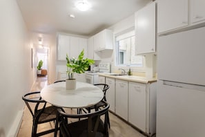Bright kitchen with modern layout and greenery