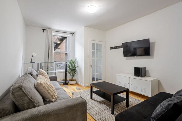 Bright and cozy living space perfect for relaxing or streaming your favorites