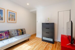 Bright and playful lounge space with a pop of personality.