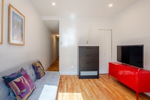 Modern living space with entertainment and vibrant design flair.