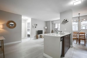 Same inviting space, now from the kitchen’s point of view!