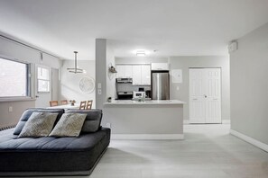 Yet another angle of this bright and modern living space!