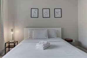 A serene and stylish bedroom designed for restful nights
