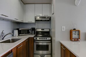 A fully equipped kitchen with everything you need to cook and enjoy a homemade meal