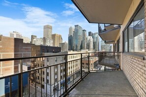 Enjoy breathtaking city views from your private balcony