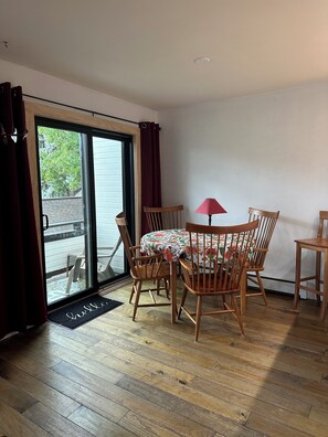 Rustic Walnut floors and comfortable natural cherry dining chairs!