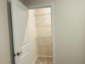 Walk-in closet in bedroom