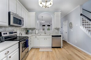 Large, open, well stocked. Ample cooking utensils and dishes.