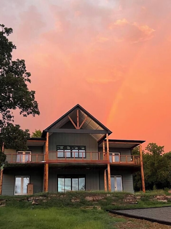 Our lovely neighbor took this for us before a storm and we just love it. No matter what the weather, there is something to love about this place. Picture yourself with family and friends enjoying the beauty while visiting and rocking.