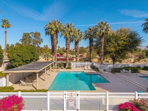 Pool right next door to us has a shade structure & captivating mountains view!