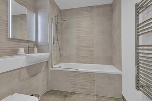 Bathroom with bath-shower, sink and toilet