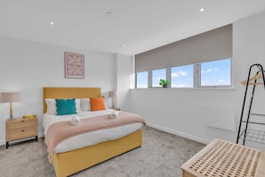 Comfortable bedroom with double bed 