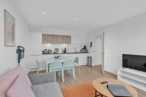 Spacious living area  with natural light coming in