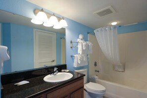 Fresh, clean, and beach-ready! This well-appointed bathroom features a full shower/tub combo, soft towels, and bright lighting—perfect for refreshing after a fun-filled day in Myrtle Beach.