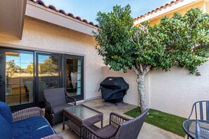 Private patio backs up to the walking path and golf course