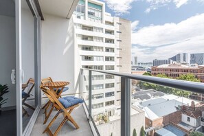 Savour quiet moments on your private balcony, complete with seating for two—perfect for morning coffee or evening chats.