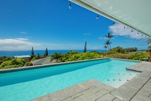 Swimming pool with expansive coastline views