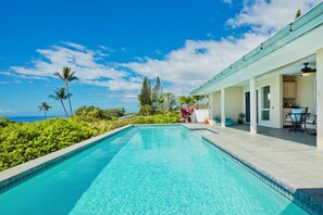 Swimming pool with expansive coastline views