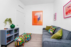 Cozy den with a comfy sofa bed – perfect for relaxing or accommodating extra guests.