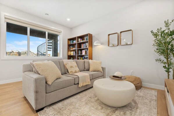 Cozy 3-4 seater luxury grade sofa with a beautiful contemporary modern coffee table