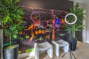 Photo wall with LED lit selfie stick for photos of the strip before The Strip!