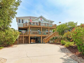 Within easy walking and biking distance to all of the restaurants and shops in Duck, this great 4-bedroom 3-bath home boasts a Private Pool and bubbly Hot Tub.